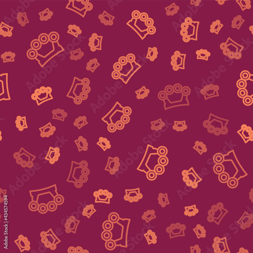 Brown line Brass knuckles icon isolated seamless pattern on red background. Vector