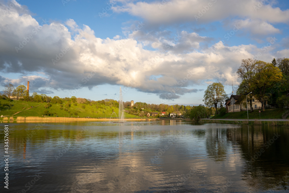 sunny summer view over the lake can see the village