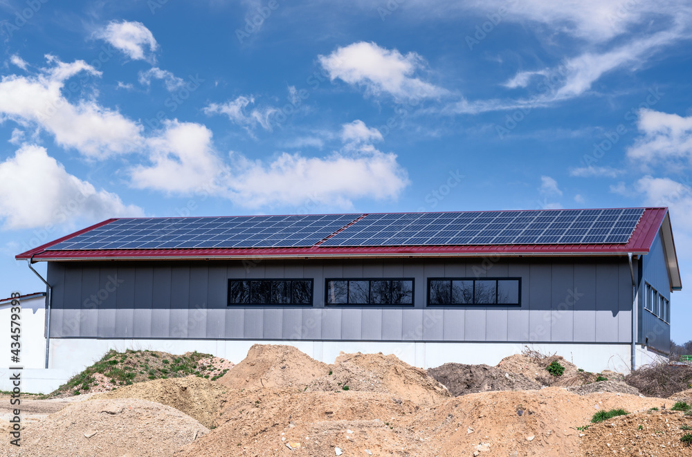 Green Energy with Solar Collectors - building modified by image editing Green Energy with Solar Collectors - building modified by image editing