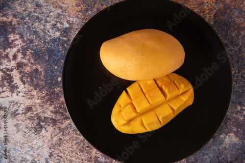 Fresh yellow mango fruit in...