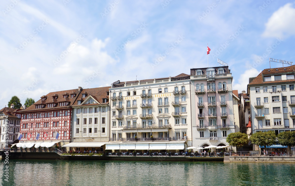 Restaurants and building on the side of Reuss river in Luzern, Switzerland.