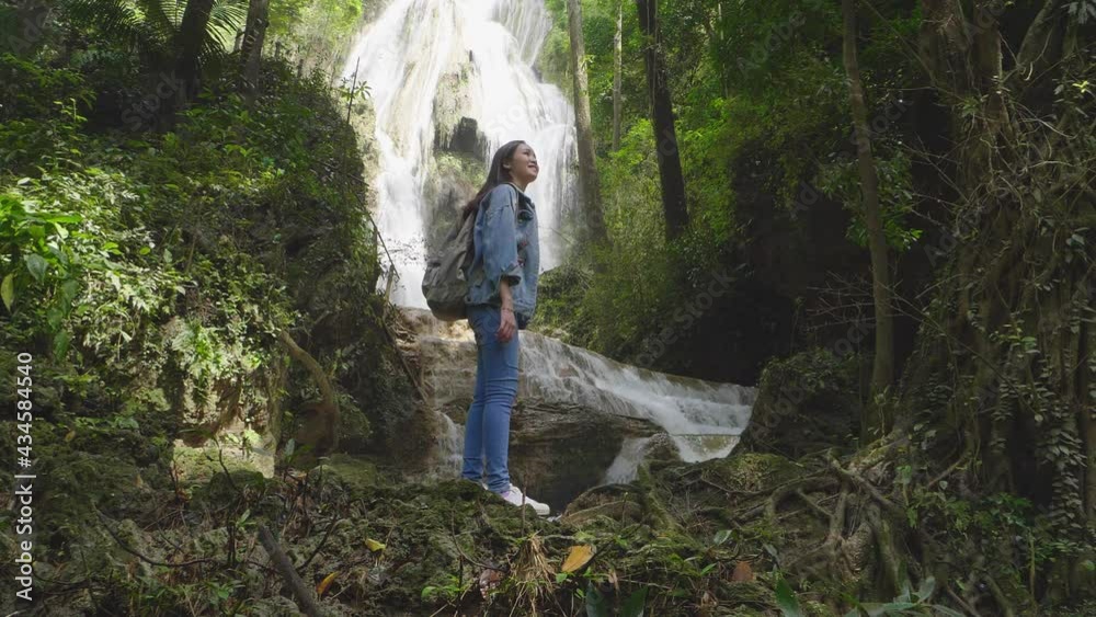 Asian Girl With Waterfalls, Slow Motion
Asian Girl With Waterfalls, Slow Motion