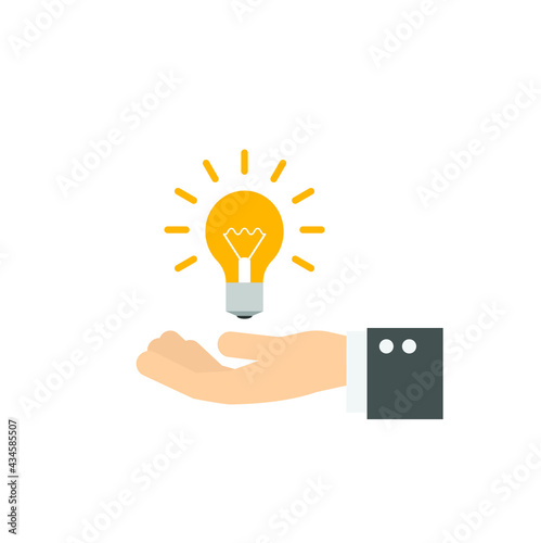 hand holding bulb with idea