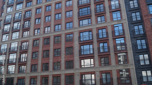 multi-storey house with many glass windows new building