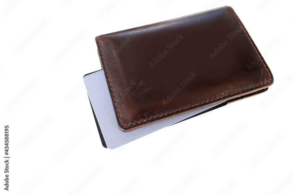 close-up of payment credit cards in a stack in a leather wallet on a white table, the concept of electronic payment, payments from bank funds, credit history, business close-up of payment credit cards in a stack in a leather wallet on a white table, the concept of electronic payment, payments from bank funds, credit history, business