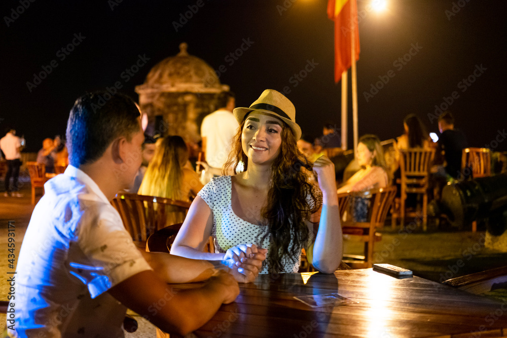 couple in an outdoor bar restaurant