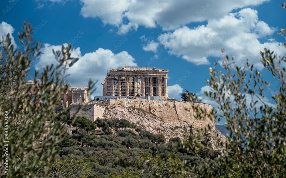 Parthenon on Acropolis of Athens Greece, under a blue sky with some white clouds