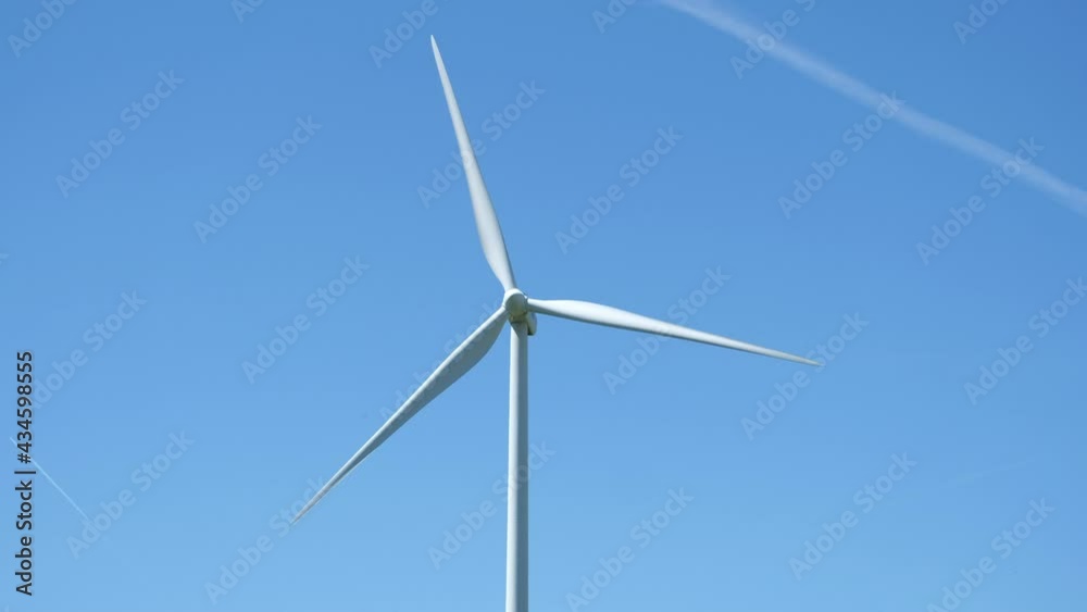 Windmill in motion. Renewable energies Windmill in motion. Renewable energies