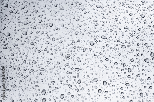 Many different drops of water on the metal surface © romaset