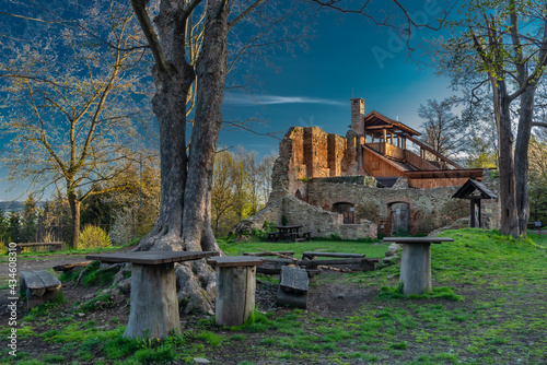 Januv castle over Vizovice town in fresh spring sunny morning photo