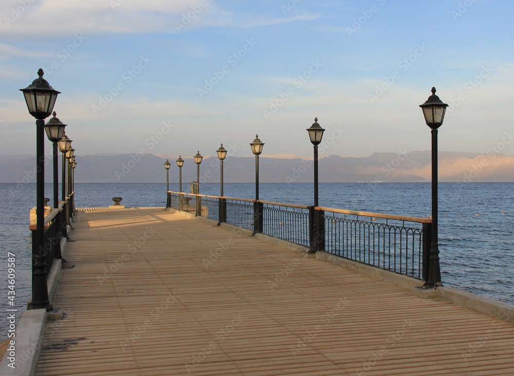 Pier at sunset in the Gulf of Aqaba, Jordan, Middle East