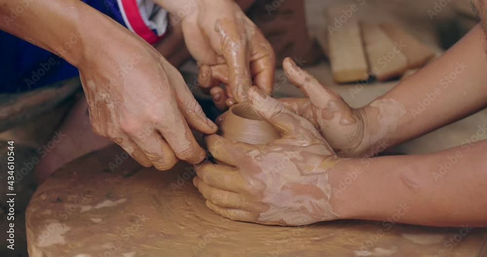 Potter Teaches The Student The Art Of Clay Pottery
Potter Teaches The Student The Art Of Clay Pottery