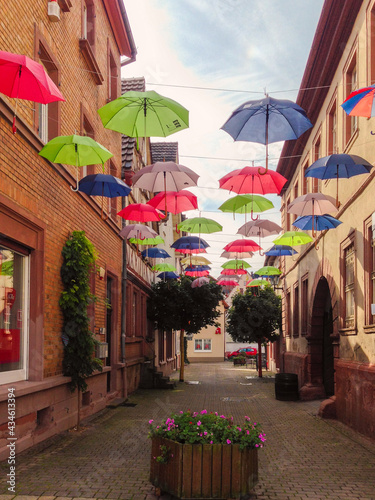 Street in German town decorated with umbrellas