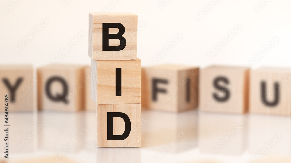 word bid from wooden blocks with letters, concept word bid from wooden blocks with letters, concept