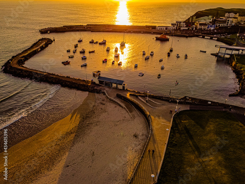Drone aerial photo, Portrush Harbour sunset, Causeway coast and Glens, County Antrim, Northern Ireland photo