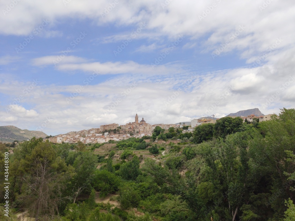 view from the mountain water route of a panoramic view of the village of chelva, valencia, capital of tourism