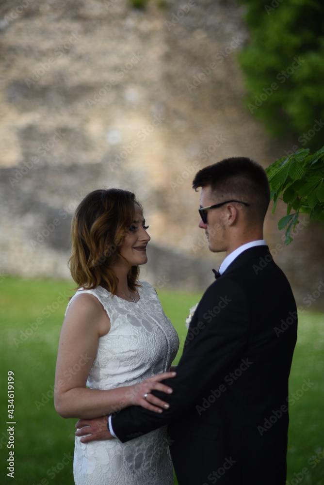 Beautiful wedding couple, Luxury married wedding couple, bride and groom posing in old city Beautiful wedding couple, Luxury married wedding couple, bride and groom posing in old city