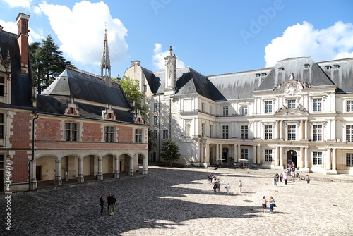 Blois Royal Castle, France. Castle courtyard: late Gothic and Renaissance buildings, 15th - 17th centuries  photo