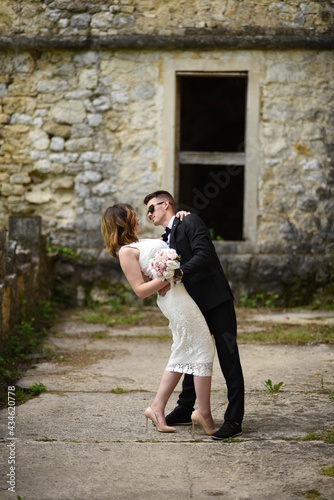Luxury married wedding couple, bride and groom posing in old city