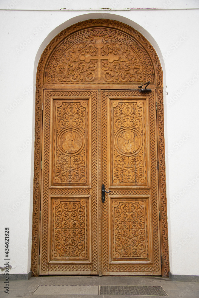 large wooden door at Dumbrava Monastery, Alba, ROMANIA, 2021,