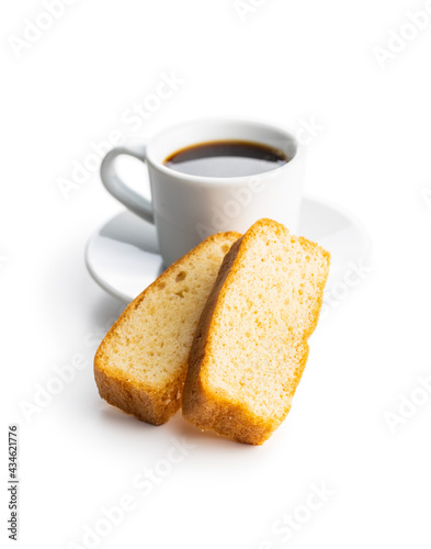 Sliced sponge dessert. Sweet sponge cake and coffee cup