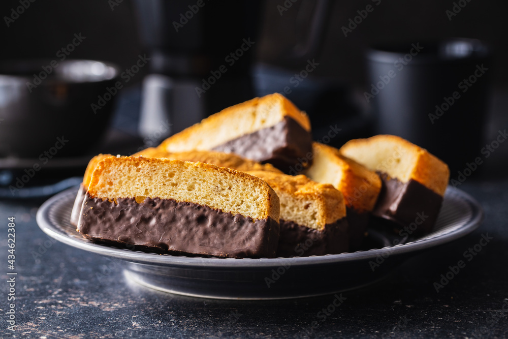 Sliced sponge dessert. Sweet sponge cake with chocolate Sliced sponge dessert. Sweet sponge cake with chocolate