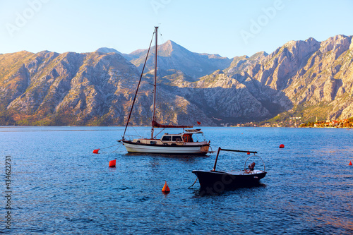 Moored boat and yacht in the bay © russieseo