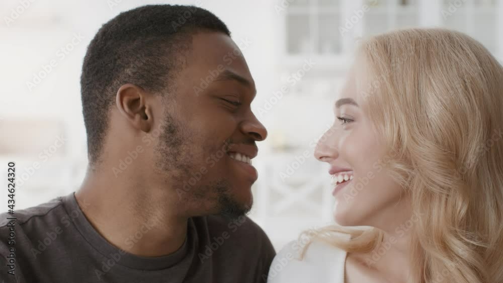 Diverse Couple Showing Heart Gesture Smiling To Camera Indoors Diverse Couple Showing Heart Gesture Smiling To Camera Indoors