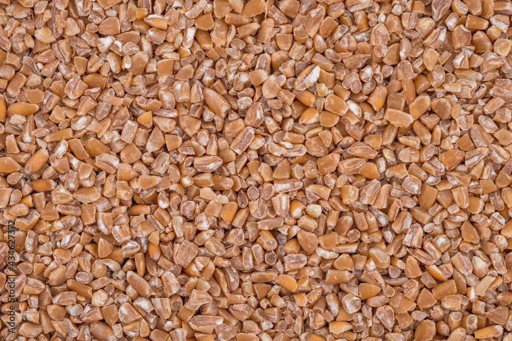 The texture of barley groats. Top view and close up of the grains of barley groats The texture of barley groats. Top view and close up of the grains of barley groats