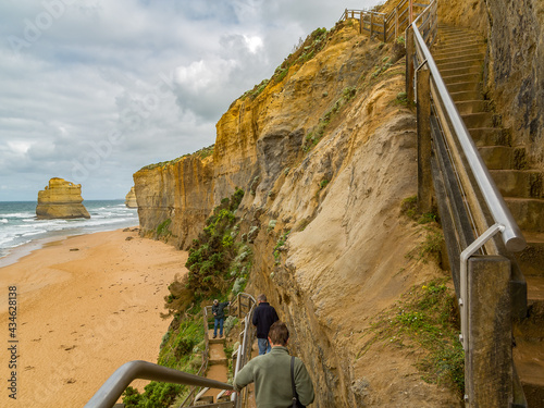 People Walking Down the Gibson Steps to Twelve Apostles Beach, Port Campbell National Park, Australia