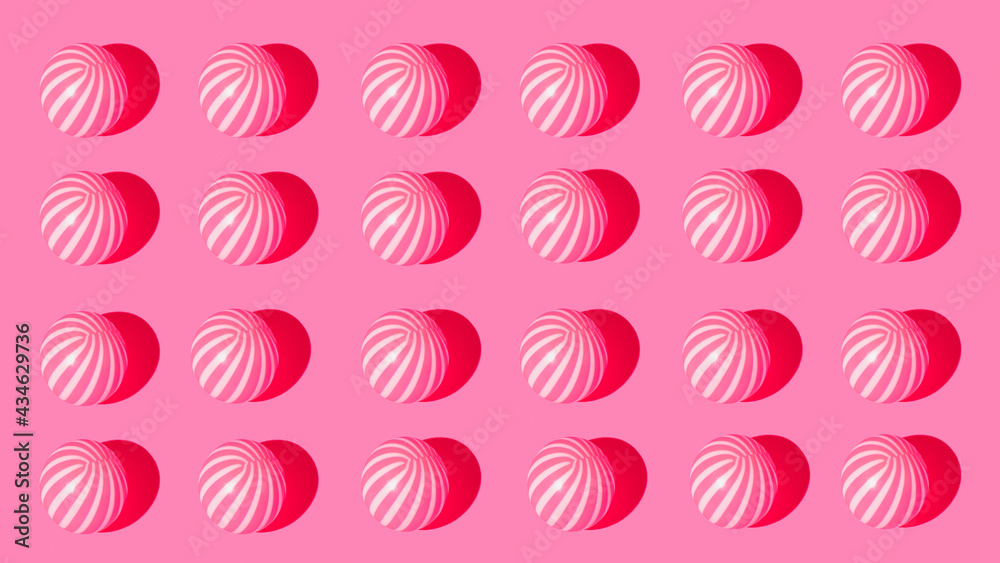 Colorful summer ball pattern on pastel pink background. Minimal summer concept. Flat lay. Colorful summer ball pattern on pastel pink background. Minimal summer concept. Flat lay.