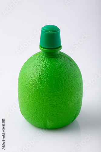 Lime concentrate bottle in green color 