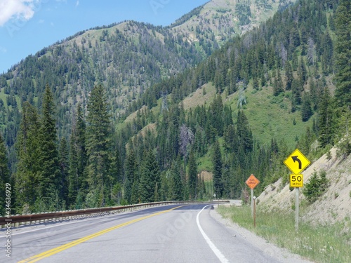 Wallpaper Mural Scenic landscape with road warning signs at Yellowstone National Park, Wyoming. Torontodigital.ca