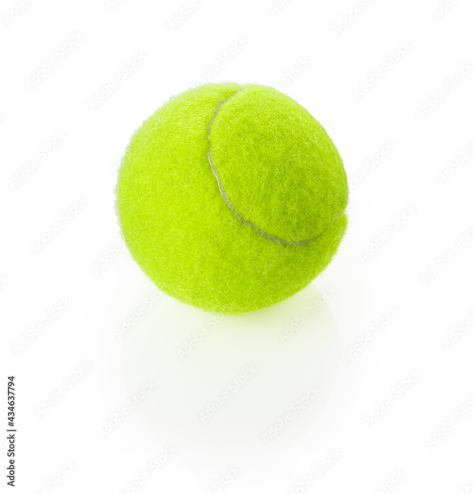 New tennis ball made of felt and rubber isolated on white background. Sports equipment of bright neon green yellow color. Design element with shadow for sports and outdoor activities. Macro.