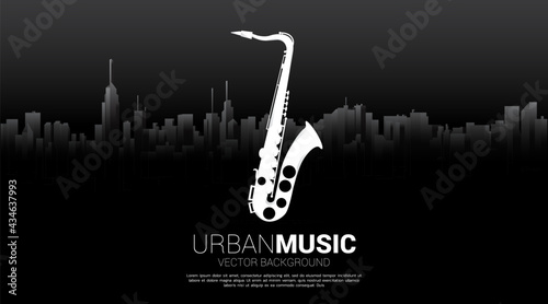 Vector silhouette of saxophone with city background. Concept for city of jazz music.