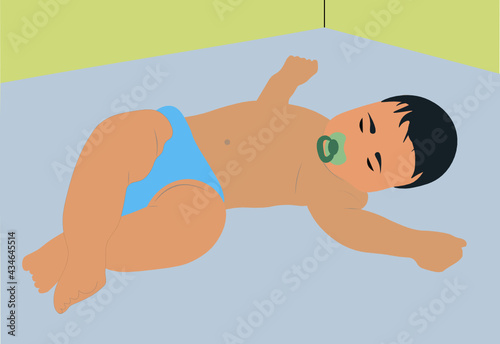 Bebe durmiendo en su cuna