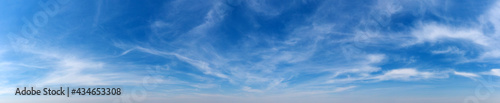 Blue Sky background with tiny Clouds. Panorama background