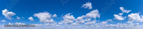 Blue Sky background with tiny Clouds. Panorama background © Pakhnyushchyy