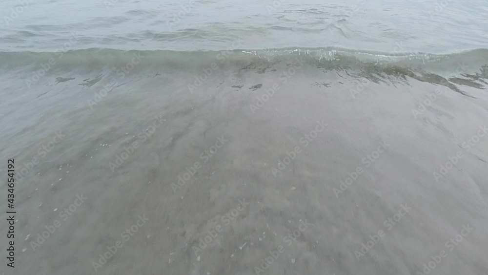 The waves billowed on the beach The waves billowed on the beach