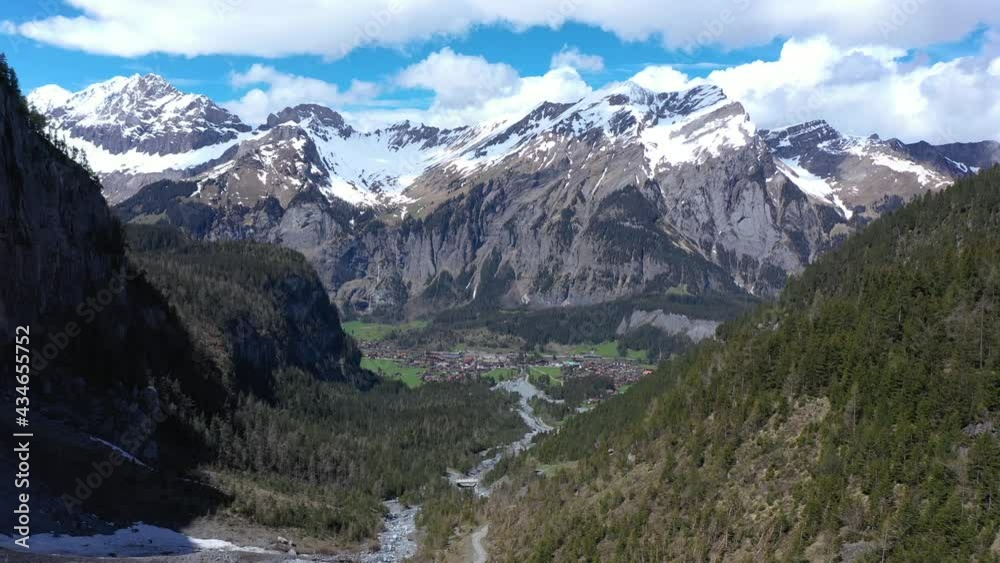 Drone flight over a beautiful alpine glacier valley and vast mountainous landscape. Kandersteg, Switzerland. Drone flight over a beautiful alpine glacier valley and vast mountainous landscape. Kandersteg, Switzerland.