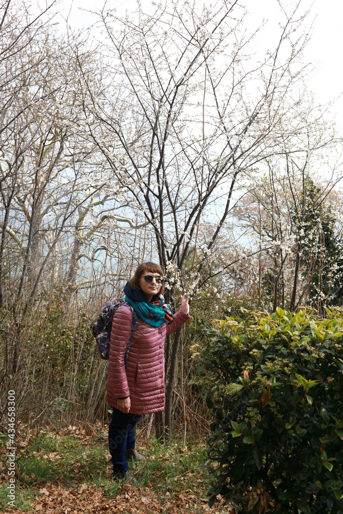 Woman posing in Livadia Park in spring