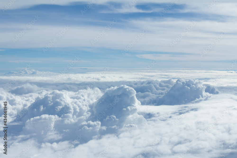 Sky and clouds looking form airplane window Sky and clouds looking form airplane window