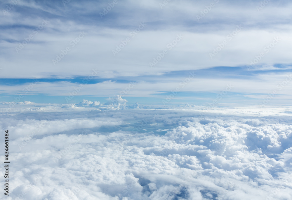 Sky and clouds looking form airplane window Sky and clouds looking form airplane window