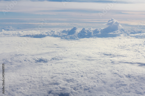 Sky and clouds looking form airplane window © Soranut
