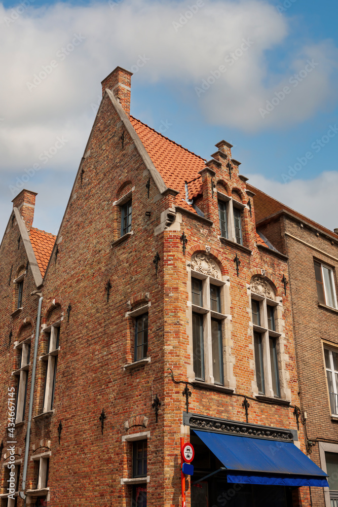 Facades and roofs of houses in the Gothic style. Bruges, Belgium