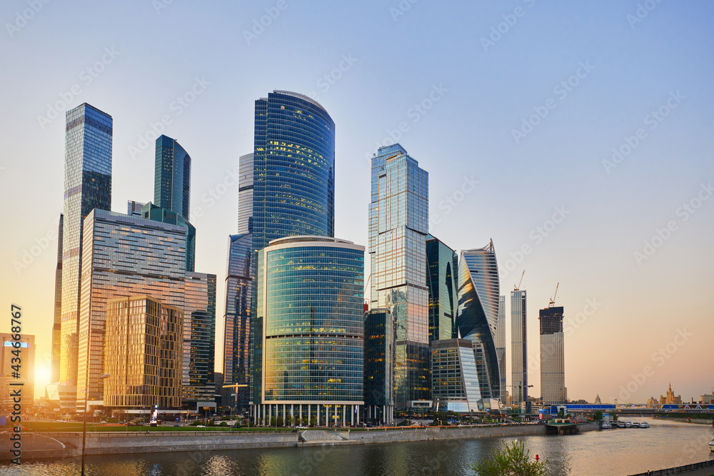 Urban landscape of Moscow-city, downtown business center with tall buildings. Skyscrapers in light sunset and blue sky at evening. Moscow. Russia.