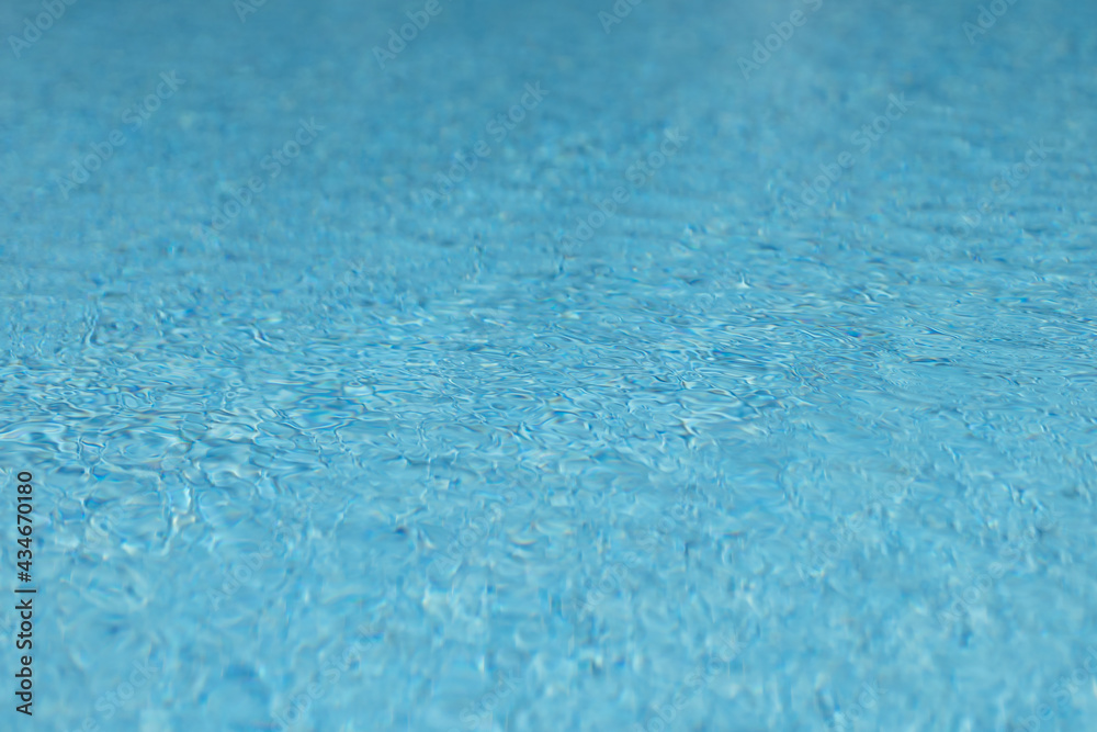 Obraz premium ripple on blue water surface 