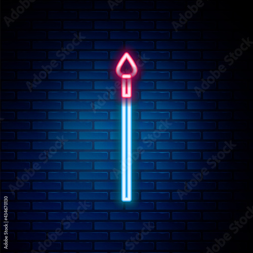Glowing neon line Medieval spear icon isolated on brick wall background. Medieval weapon. Colorful outline concept. Vector