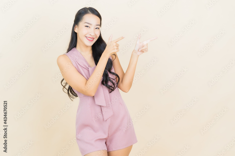 Portrait beautiful young asian woman smile with action Portrait beautiful young asian woman smile with action