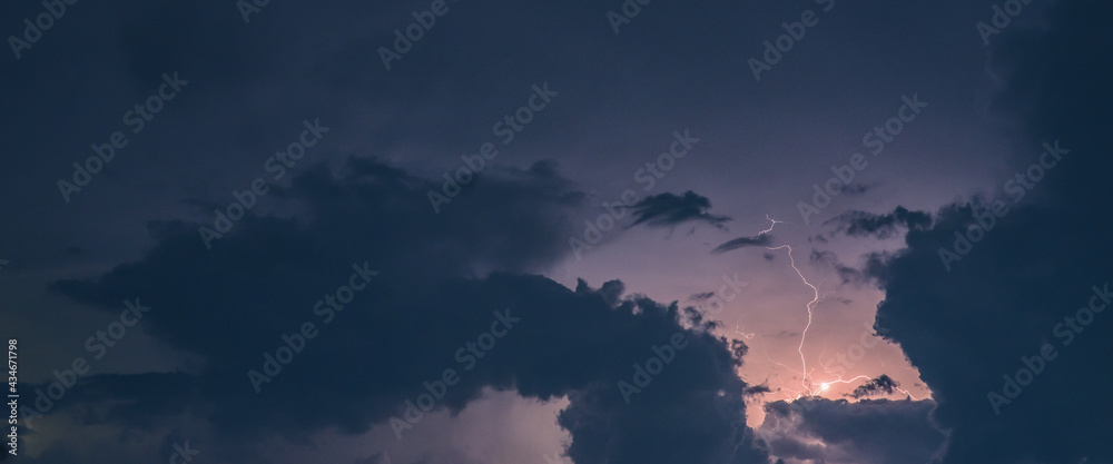 Storm. Lightning in the landscape.Thunderstorm Clouds with Lightning